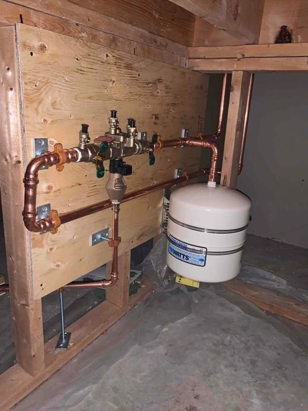 Backflow preventer and thermal expansion tank on copper piping
