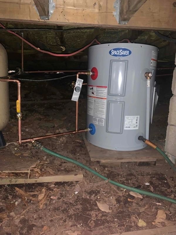 New hot water tank installed with copper supply lines
